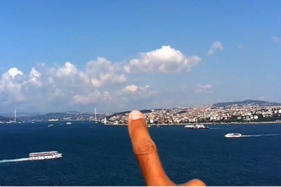 Juan Duque. Finger tracing the skyline of Asia, standing in Europe, Istanbul 2013 (video still)